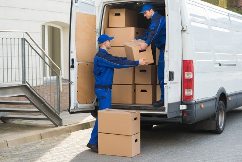 Van loading reusable furniture and recyclable items for a sustainable move in West Drayton
